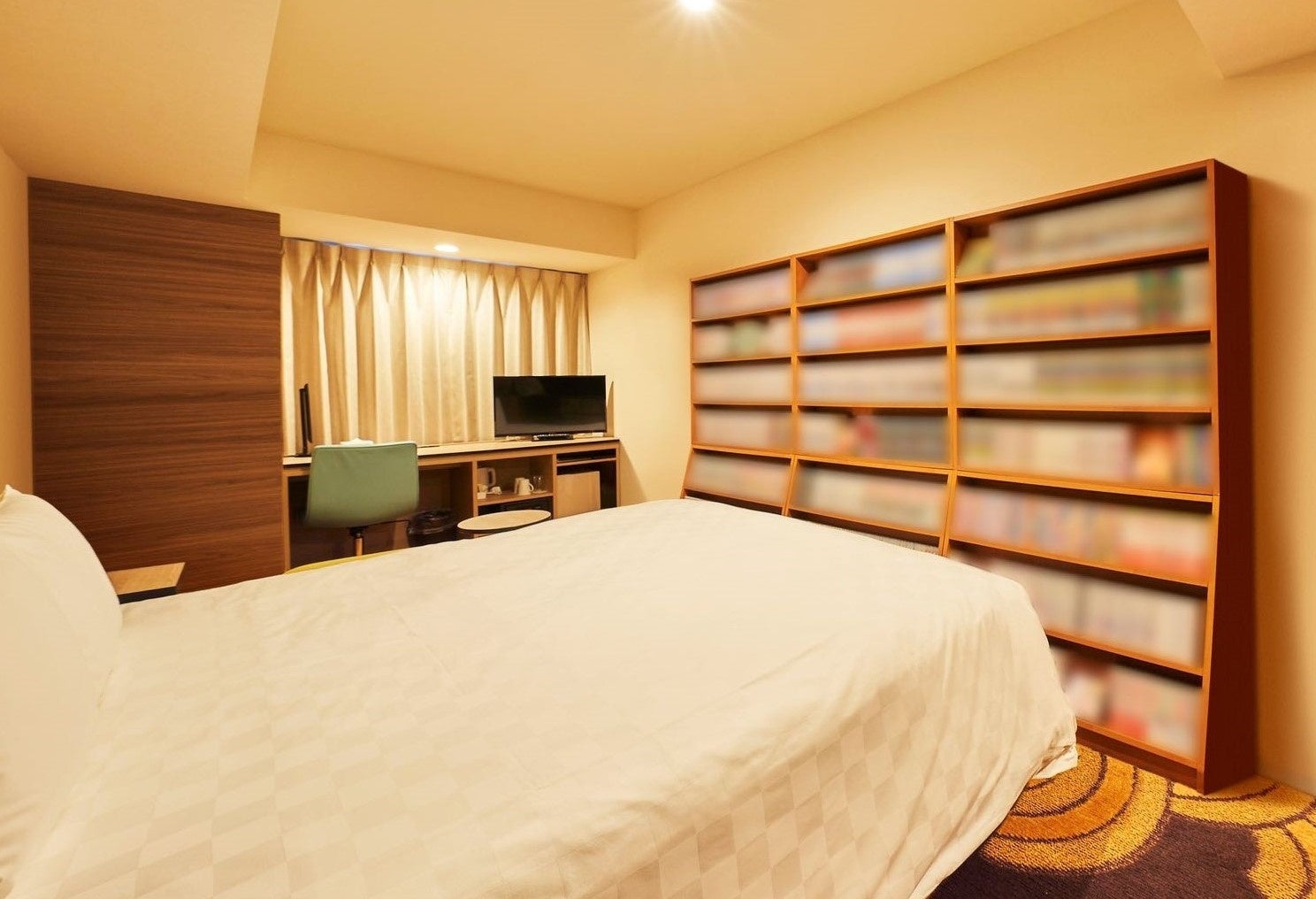 Image of a guest room stocked with BL comics