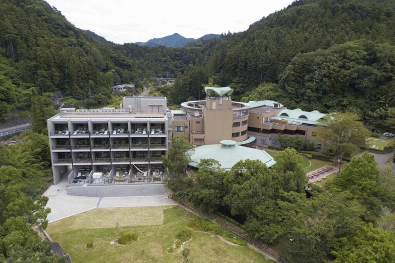 A relaxing retreat in Musashi Province with lush greenery and clear streams